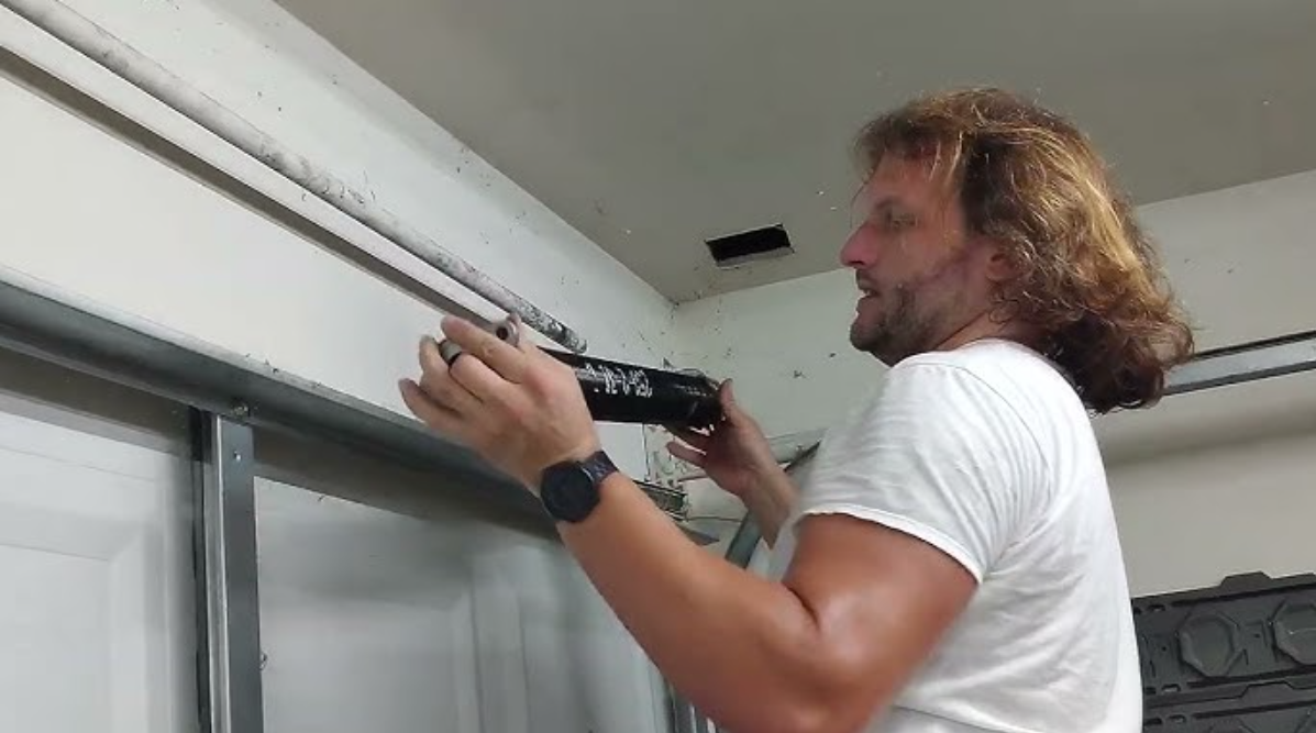 Managing “Slab Heave” to Save Your Garage Door Spring Repair