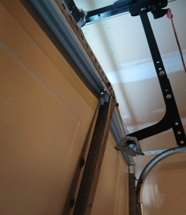 garage door track repair.